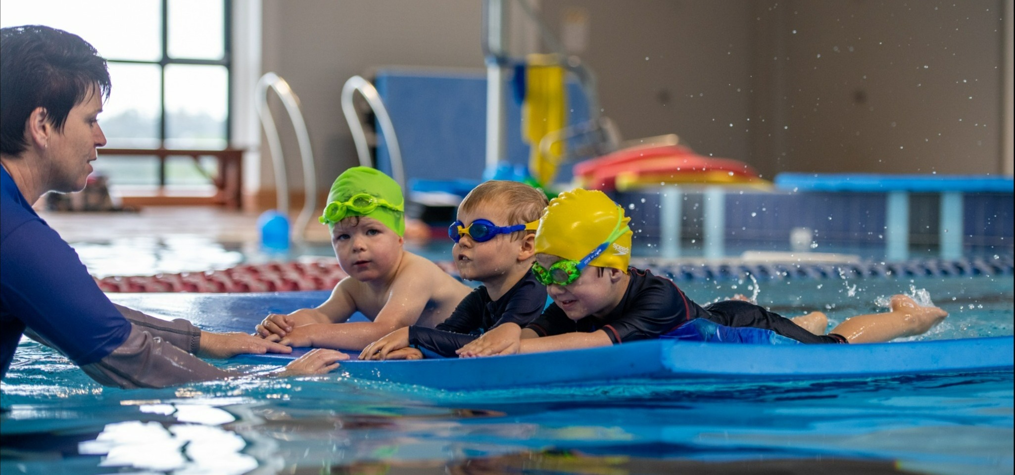 Boys learning to swim